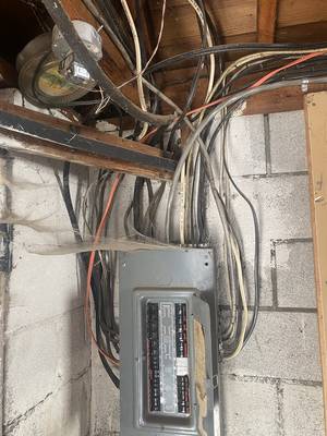 Example of unsafe wiring to an electrical panel